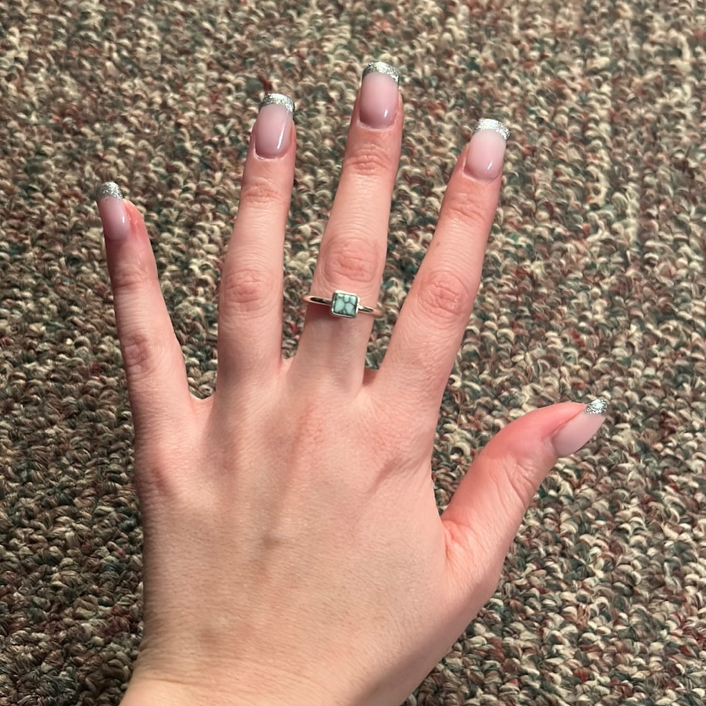 Silver ring with granite blue stone